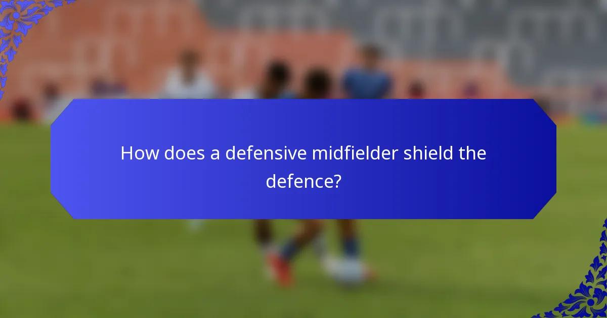 How does a defensive midfielder shield the defence?